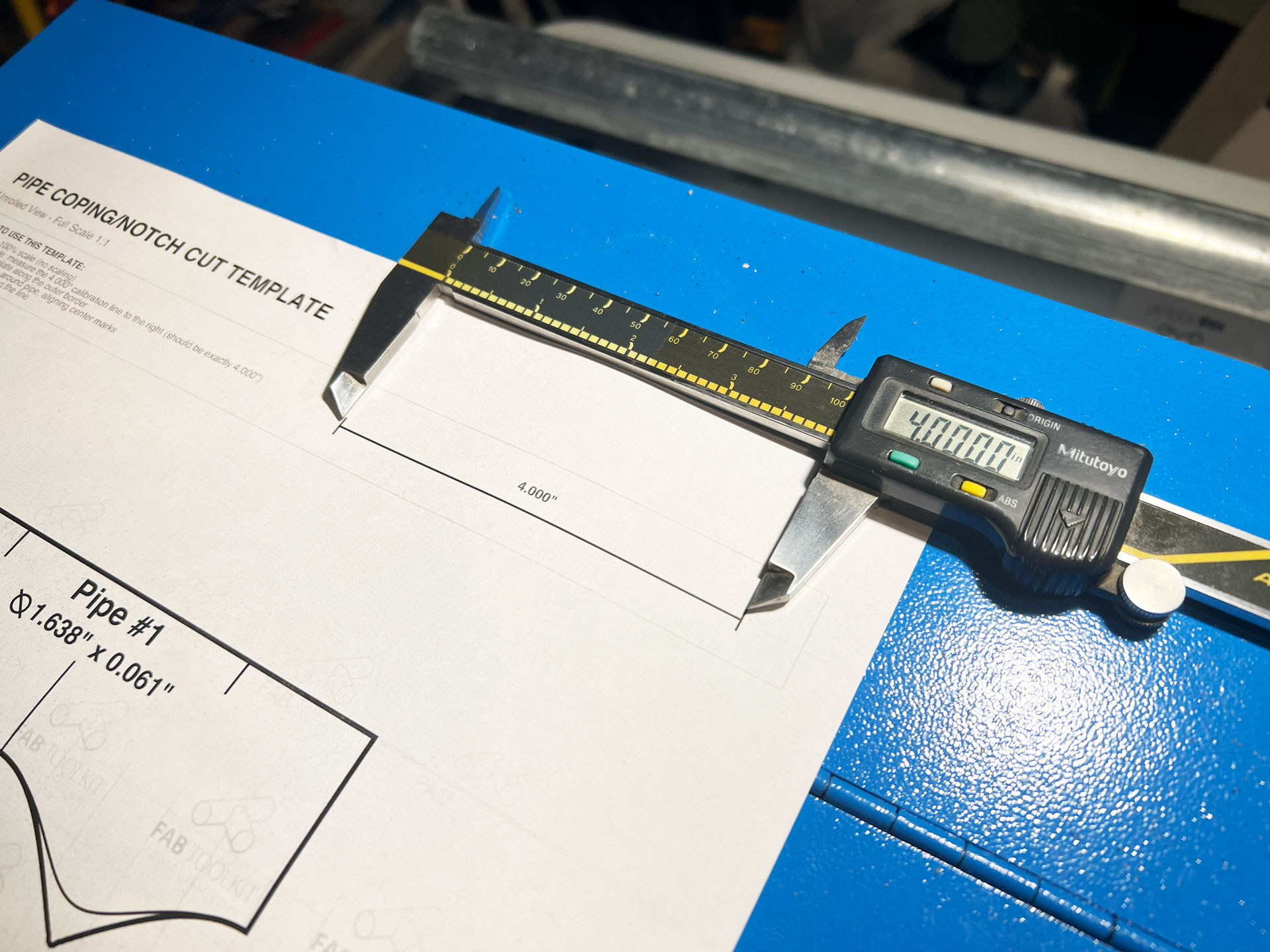 Printed template with scale check using a ruler